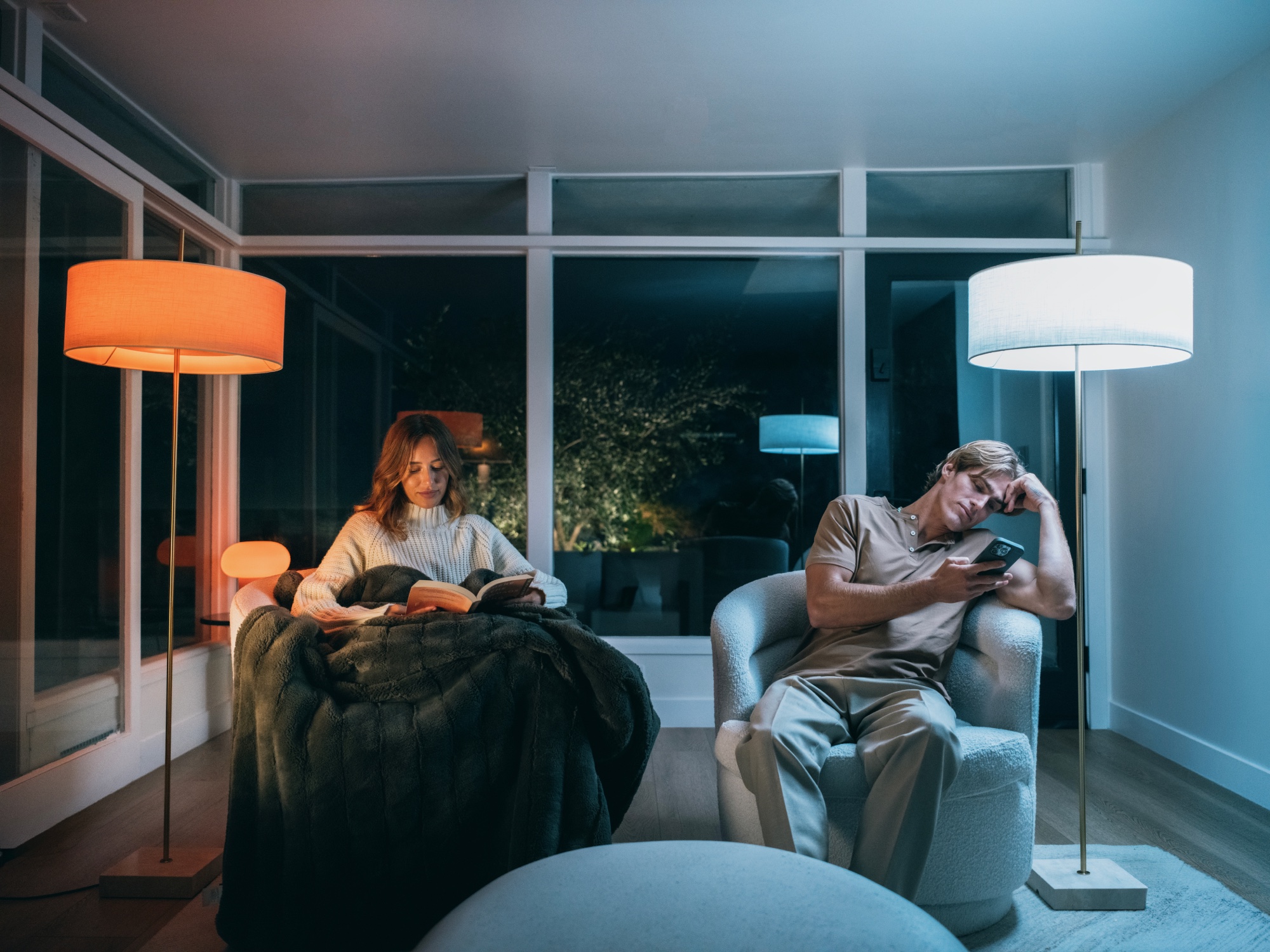 Side-by-side warm and cool lightbulb comparison in a living room